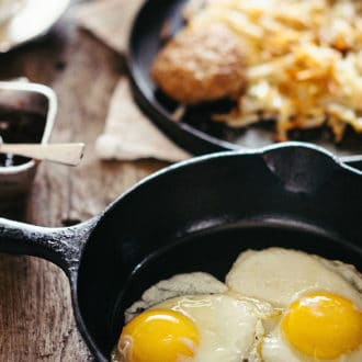 breakfast with fried eggs in pan