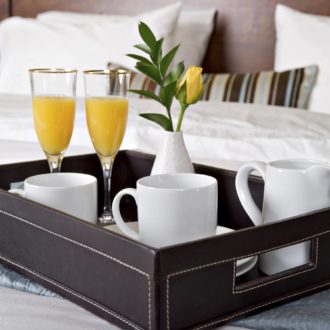 breakfast in bed with orange juice and tea