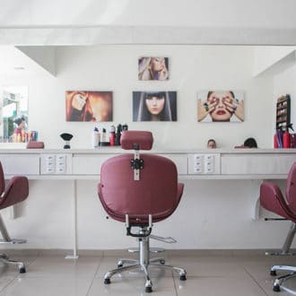 Hairdressing salon with chairs and mirror