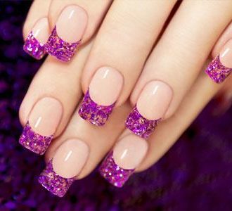 Nude nails with glitter purple tips