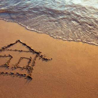 house drawn in sand