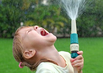 watering-child-summer