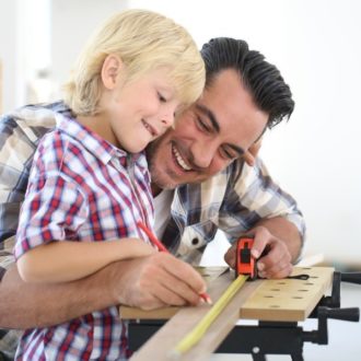 Father with child renovating