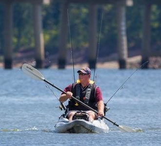Kayaking with fishing poles