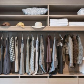organised wardrobe with hanging clothes