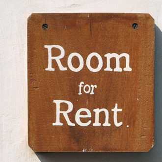 Wooden room for rent sign