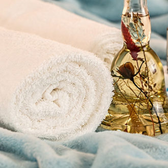 Towels and essential oils for massage
