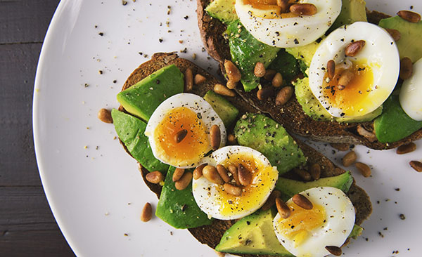 toast with avocado and boiled eggs