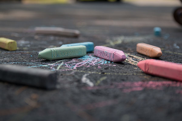 Colourful chalk drawing on driveway