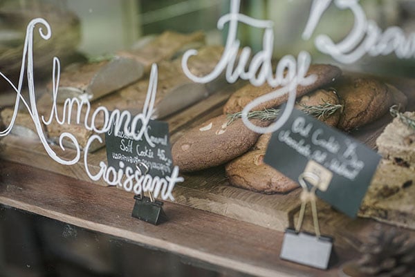 bakery glass window with croissants and biscuit display