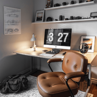 Home office with brown chair