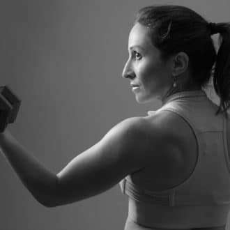 Woman holding a dumbell